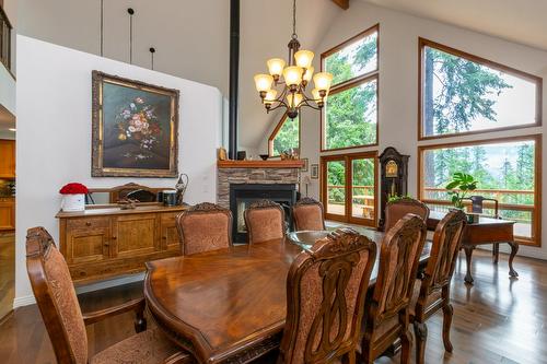 2611 Duncan Road, Blind Bay, BC - Indoor Photo Showing Dining Room With Fireplace