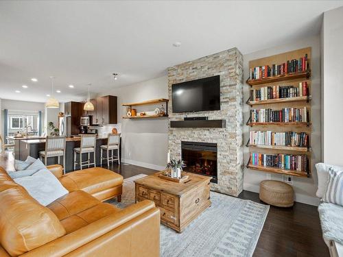 23-600 Sherwood Road, Kelowna, BC - Indoor Photo Showing Living Room With Fireplace