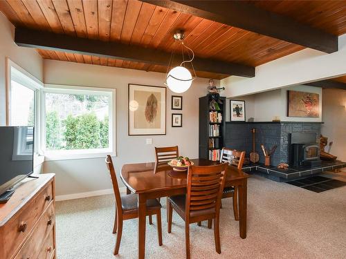 361 Urquhart Ave, Courtenay, BC - Indoor Photo Showing Dining Room With Fireplace