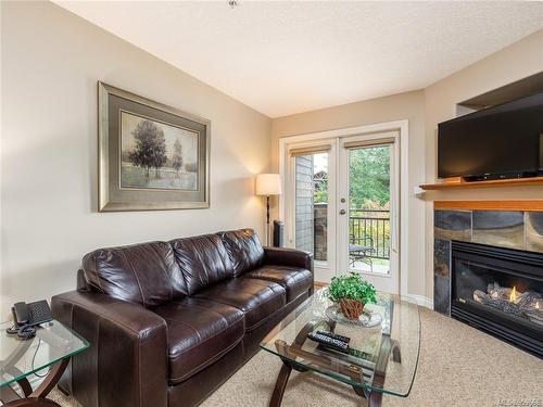 422-1175 Resort Dr, Parksville, BC - Indoor Photo Showing Living Room With Fireplace