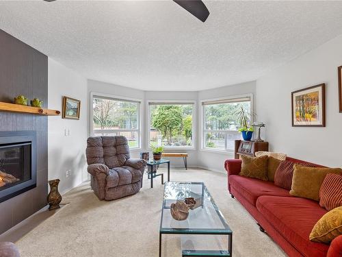 612 Qualicum Rd, Qualicum Beach, BC - Indoor Photo Showing Living Room With Fireplace