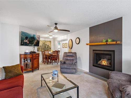 612 Qualicum Rd, Qualicum Beach, BC - Indoor Photo Showing Living Room With Fireplace