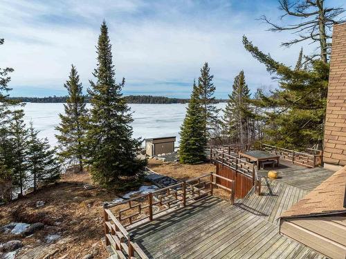 110 N Poplar Bay Road North, S Of Keewatin, ON - Outdoor With Body Of Water With Deck Patio Veranda With View
