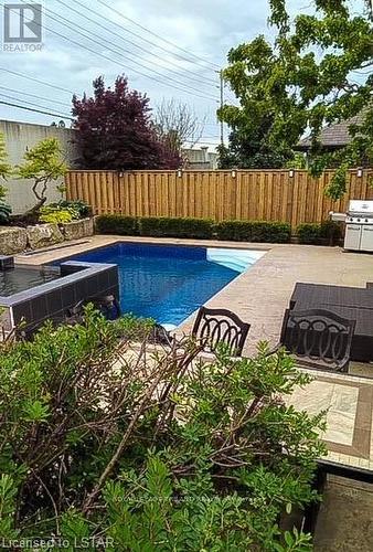 46 - 777 Apricot Drive, London, ON - Outdoor With In Ground Pool With Backyard