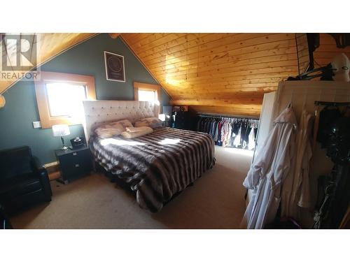 7017 Little Green Lake Road, 70 Mile House, BC - Indoor Photo Showing Bedroom