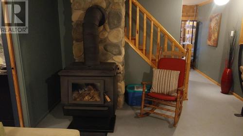 7017 Little Green Lake Road, 70 Mile House, BC - Indoor Photo Showing Other Room With Fireplace