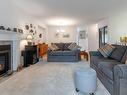 105-1634 Carmi Avenue, Penticton, BC  - Indoor Photo Showing Living Room With Fireplace 