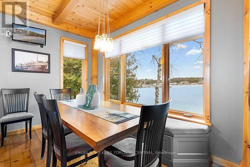 54 William Street, Northern Bruce Peninsula, ON - Indoor Photo Showing Dining Room With Body Of Water