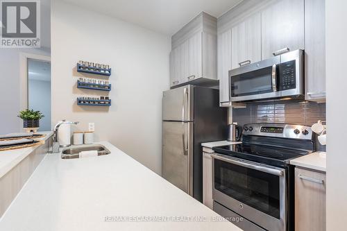 #402 -150 Main St W, Hamilton, ON - Indoor Photo Showing Kitchen With Double Sink
