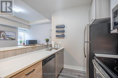 #402 -150 Main St W, Hamilton, ON - Indoor Photo Showing Kitchen With Double Sink