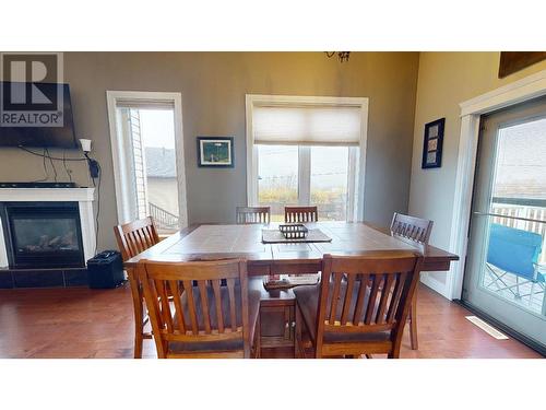 11727 88 Street, Fort St. John, BC - Indoor Photo Showing Dining Room With Fireplace