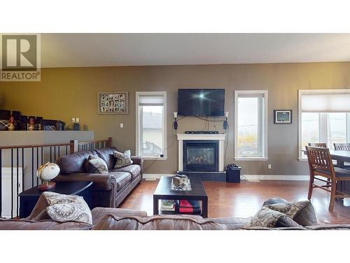 11727 88 Street, Fort St. John, BC - Indoor Photo Showing Living Room With Fireplace