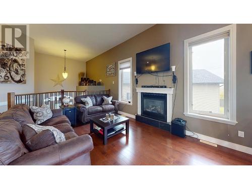 11727 88 Street, Fort St. John, BC - Indoor Photo Showing Living Room With Fireplace
