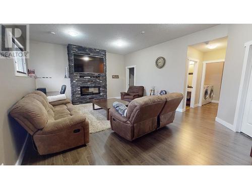 11727 88 Street, Fort St. John, BC - Indoor Photo Showing Living Room With Fireplace