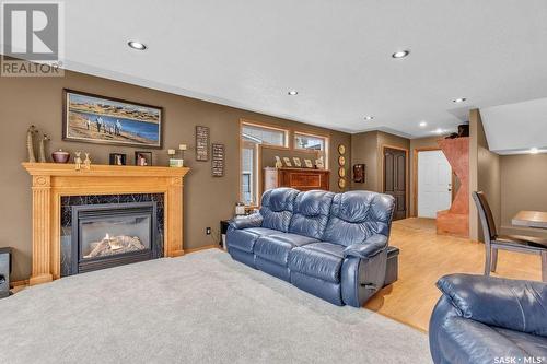 516 Ryer Place, Swift Current, SK - Indoor Photo Showing Living Room With Fireplace