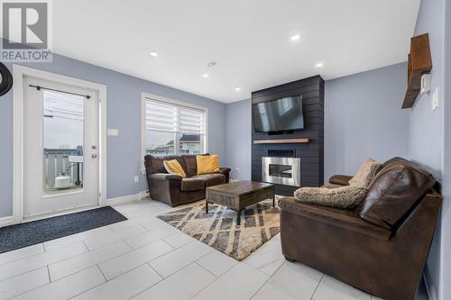 21 Curden Place, Conception Bay South, NL - Indoor Photo Showing Living Room With Fireplace