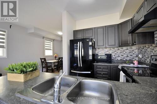 #96 -21 Diana Ave, Brantford, ON - Indoor Photo Showing Kitchen With Double Sink