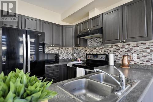 #96 -21 Diana Ave, Brantford, ON - Indoor Photo Showing Kitchen With Double Sink