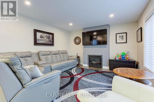 128 Schmidt Dr, Wellington North, ON - Indoor Photo Showing Living Room With Fireplace