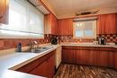 2363 Highway 3A, Castlegar, BC  - Indoor Photo Showing Kitchen With Double Sink 