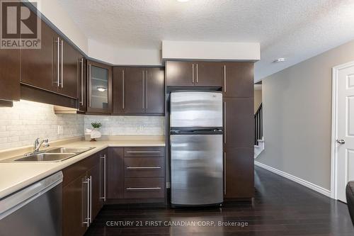 #68 -1059 Whetherfield St, London, ON - Indoor Photo Showing Kitchen With Double Sink
