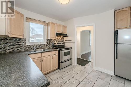42 East 11Th St, Hamilton, ON - Indoor Photo Showing Kitchen With Double Sink