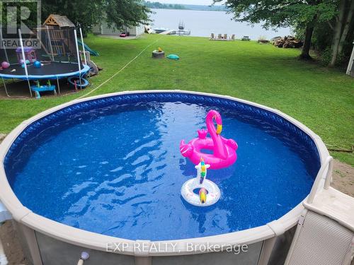 130 Crawford Road, Kawartha Lakes, ON - Outdoor With Above Ground Pool With Backyard