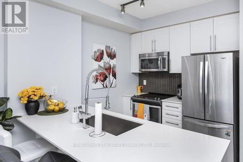 #2403 -4011 Brickstone Mews, Mississauga, ON - Indoor Photo Showing Kitchen With Stainless Steel Kitchen