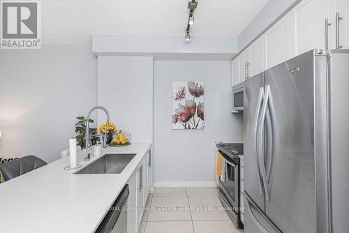 #2403 -4011 Brickstone Mews, Mississauga, ON - Indoor Photo Showing Kitchen With Stainless Steel Kitchen With Upgraded Kitchen