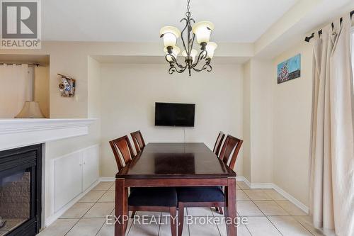 24 Redfinch Way, Brampton, ON - Indoor Photo Showing Dining Room With Fireplace