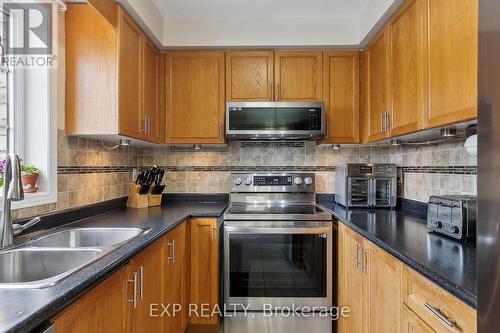 24 Redfinch Way, Brampton, ON - Indoor Photo Showing Kitchen With Double Sink