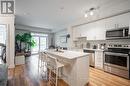 #102 -320 Plains Rd E, Burlington, ON  - Indoor Photo Showing Kitchen With Upgraded Kitchen 