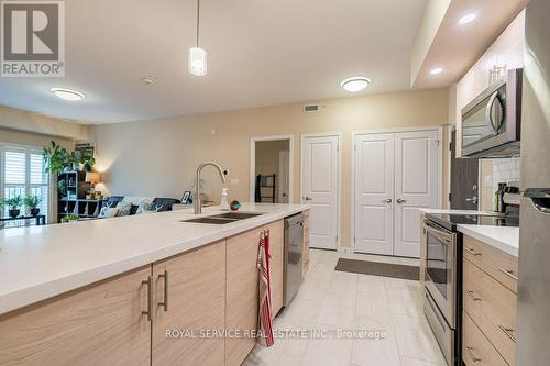 #303 -344 Florence Dr, Peterborough, ON - Indoor Photo Showing Kitchen With Double Sink