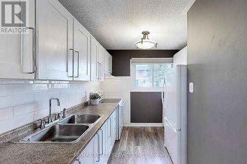 9 Greenhills Sq, Brampton, ON - Indoor Photo Showing Kitchen With Double Sink