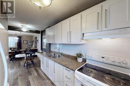 9 Greenhills Sq, Brampton, ON - Indoor Photo Showing Kitchen With Double Sink