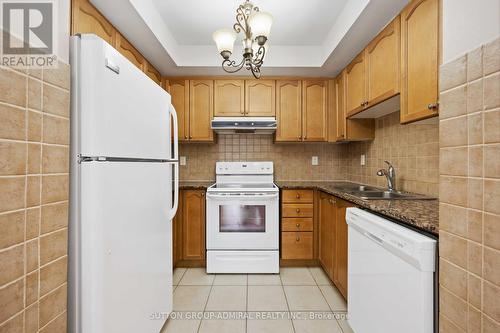 #105 -9901 Keele St, Vaughan, ON - Indoor Photo Showing Kitchen With Double Sink