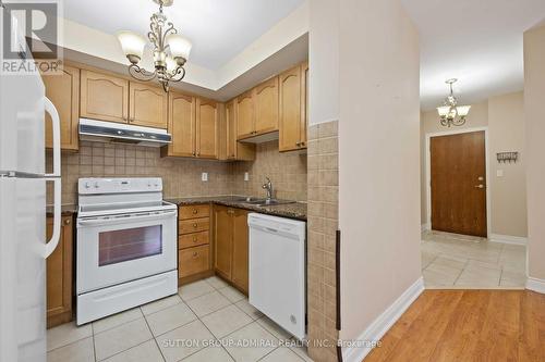 #105 -9901 Keele St, Vaughan, ON - Indoor Photo Showing Kitchen With Double Sink