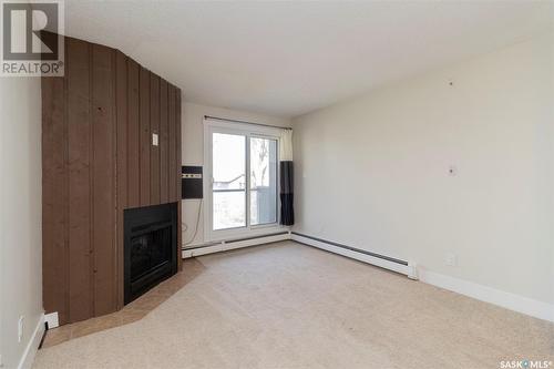 303 512 4Th Avenue N, Saskatoon, SK - Indoor With Fireplace