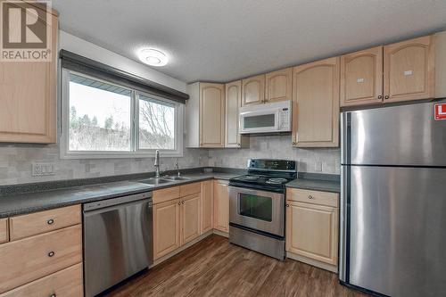 1255 Thompson Road, Kelowna, BC - Indoor Photo Showing Kitchen With Double Sink