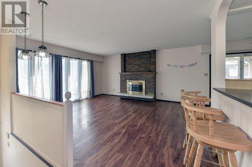 1255 Thompson Road, Kelowna, BC - Indoor Photo Showing Other Room With Fireplace