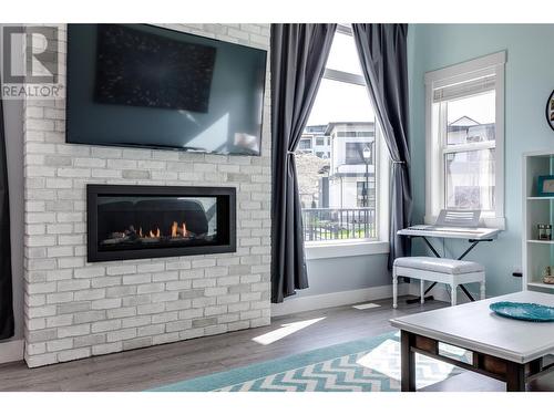 2772 Canyon Crest Drive, West Kelowna, BC - Indoor Photo Showing Living Room With Fireplace