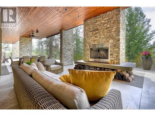 109 Flagstone Rise, Naramata, BC - Outdoor With Fireplace With Deck Patio Veranda With Exterior
