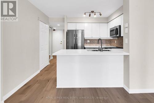 707 - 188 Redpath Avenue, Toronto, ON - Indoor Photo Showing Kitchen With Double Sink