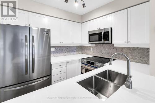 707 - 188 Redpath Avenue, Toronto, ON - Indoor Photo Showing Kitchen With Double Sink