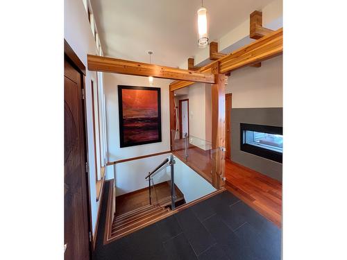 285 Kootenay Lake Road, Procter, BC - Indoor Photo Showing Other Room With Fireplace