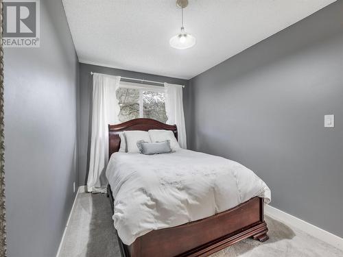 9001 Husband Road, Coldstream, BC - Indoor Photo Showing Bedroom