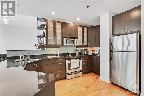 1227 Wellington Avenue Unit#303, Ottawa, ON - Indoor Photo Showing Kitchen With Double Sink