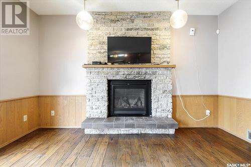 2407 Strathmore Place E, Regina, SK - Indoor Photo Showing Living Room With Fireplace