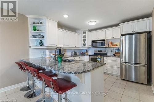 6 - 375 Edith Cavell Boulevard, Central Elgin, ON - Indoor Photo Showing Kitchen With Upgraded Kitchen