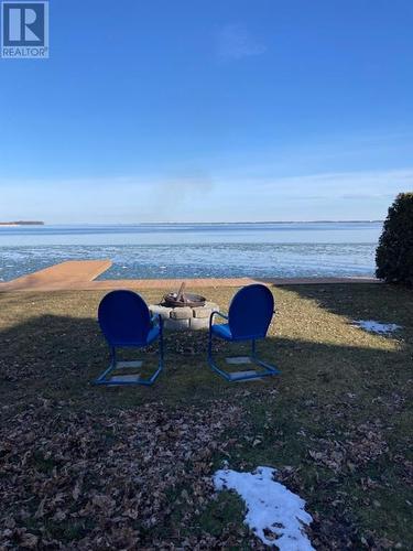 Fire by the water! - 6325 78Th Avenue, Bainsville, ON - Outdoor With Body Of Water With View